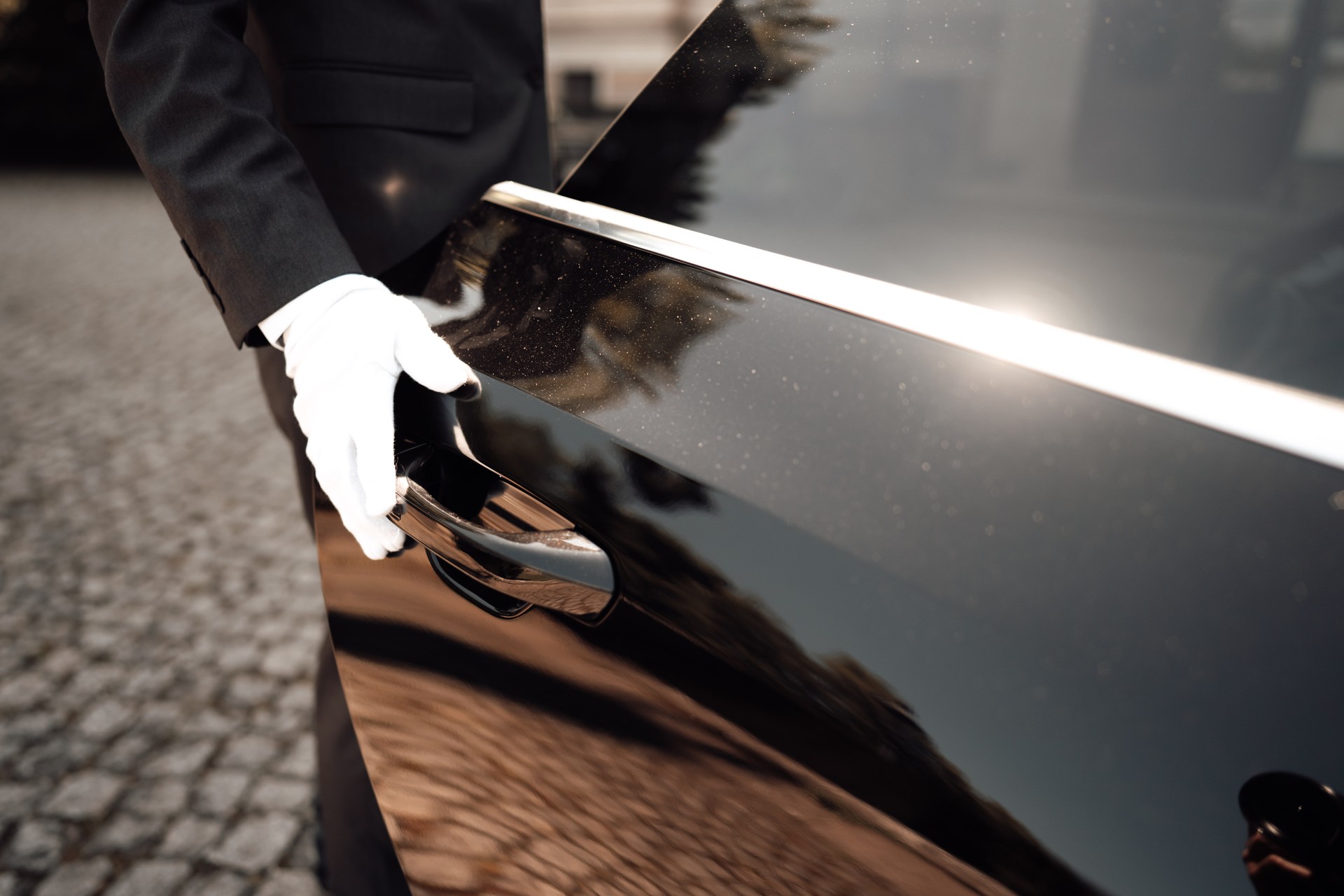 photo of a driver opening the car door